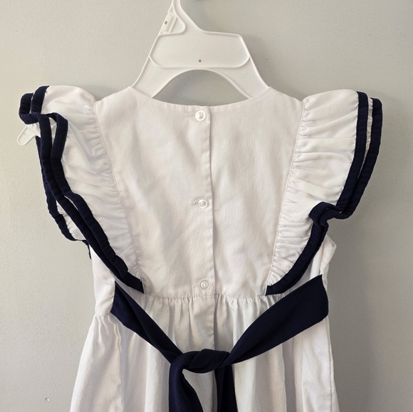 Delaney | 6 | Girls Flutter Sleeve white and navy dress - Picture 6 of 7